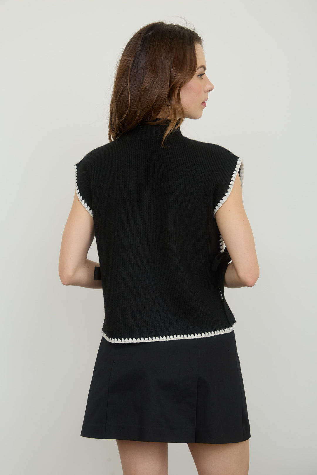 Suéter Chaleco Lateral Bow